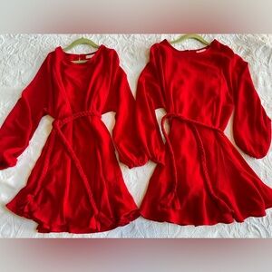 2 - GB Girls dresses. Both youth M. Long sleeve red dresses. Twins. Sisters.